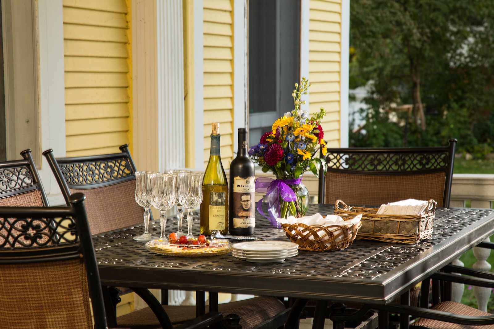 A beautiful spread of afternoon treats outside at one of the best places to stay in Baraboo, especially after a day at Mirror Lake State Park 